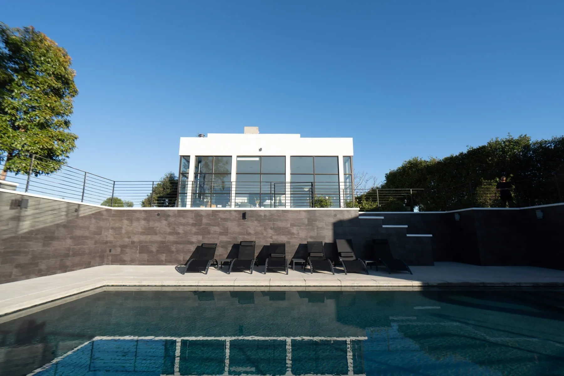 Pool terrace with hillside views at Lakeview